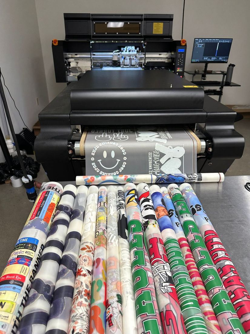 Printed transfer rolls in various sizes at a Lagos print shop